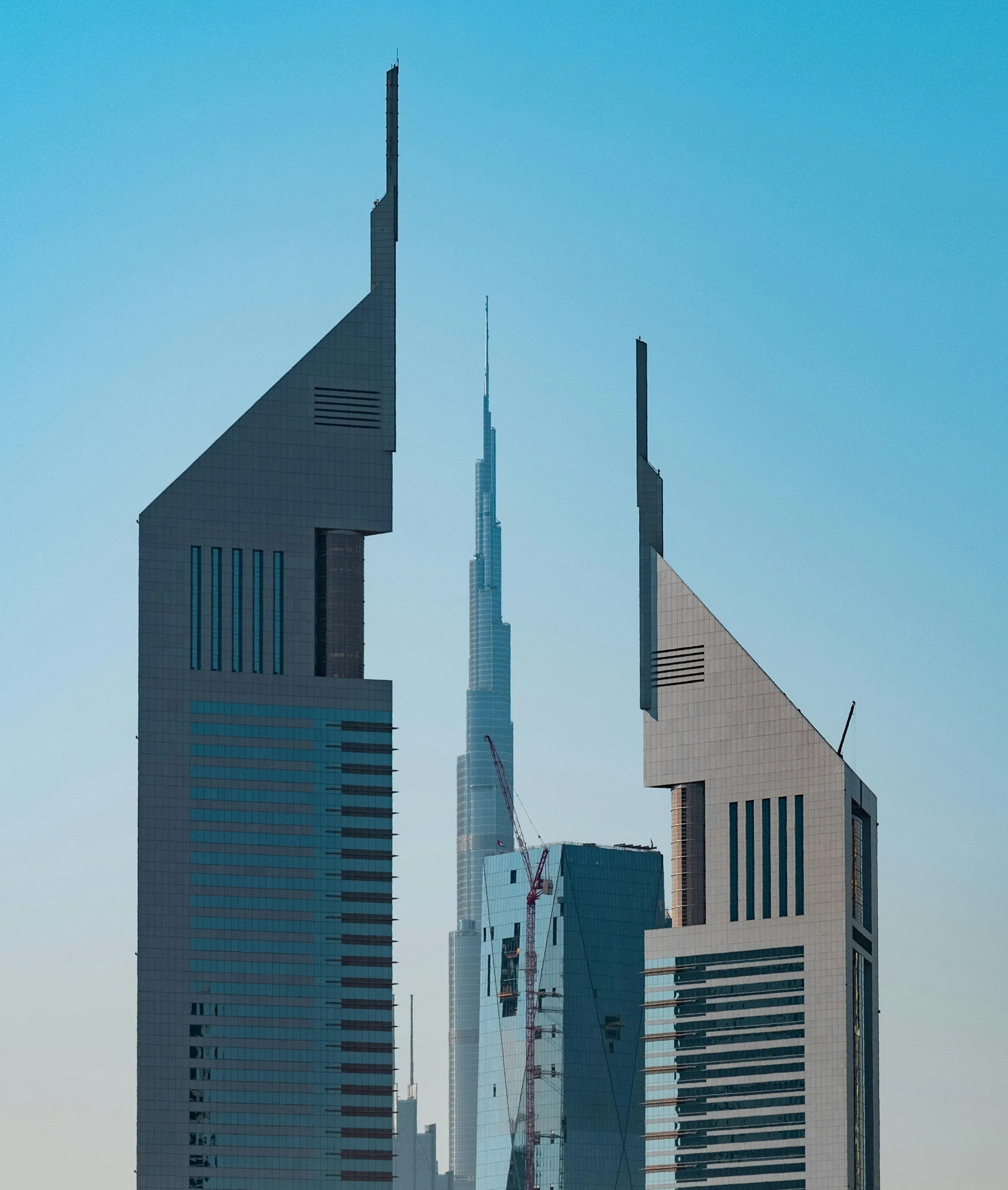 Emirates Towers on Sheikh Zayed Road, the Burj Khalifa rising between them