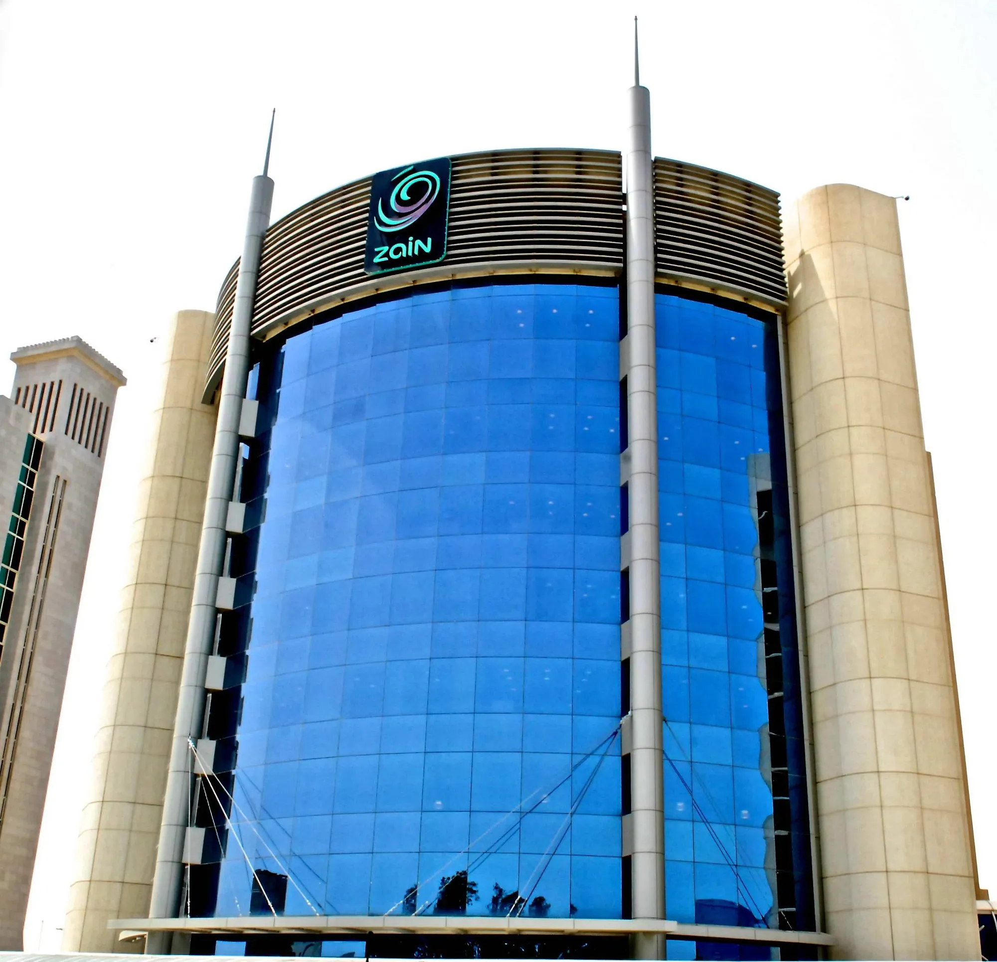 The Zain headquarters in Kuwait City, the logo above its glass front